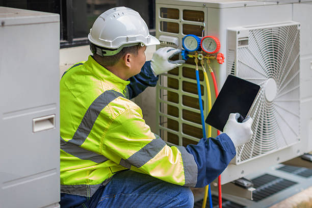 Professional Heat Pump Repair technician working in Newington, VA